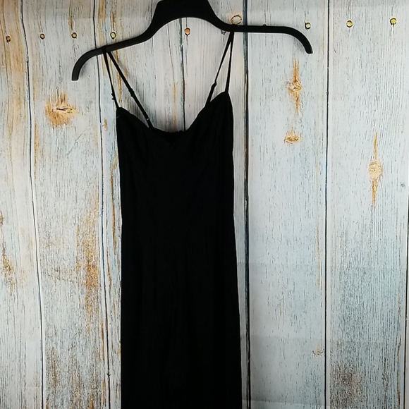 Reformation Pants - Reformation solid Black spaghetti strap Jumpsuit